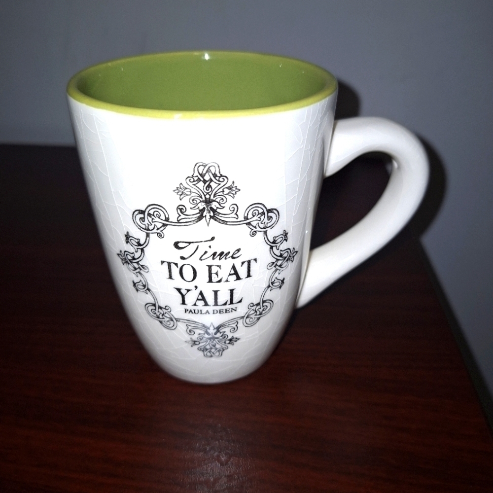 A Paula Deen Rooster print coffee/tea cup. Crackled glass design. MW/DW safe.